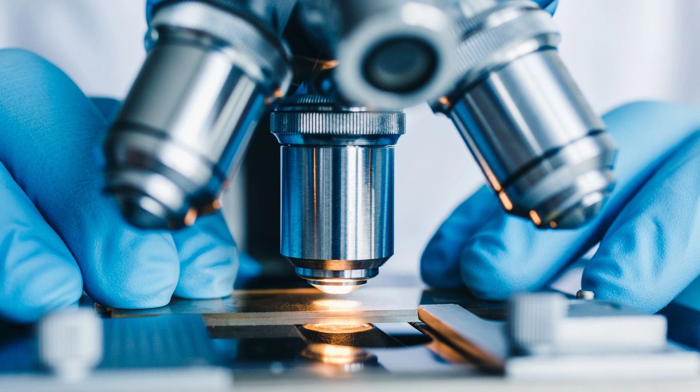Image showing microscope as part of RCH Solutions' Bio-IT Systems Administration services.